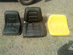 asiento tractor roto